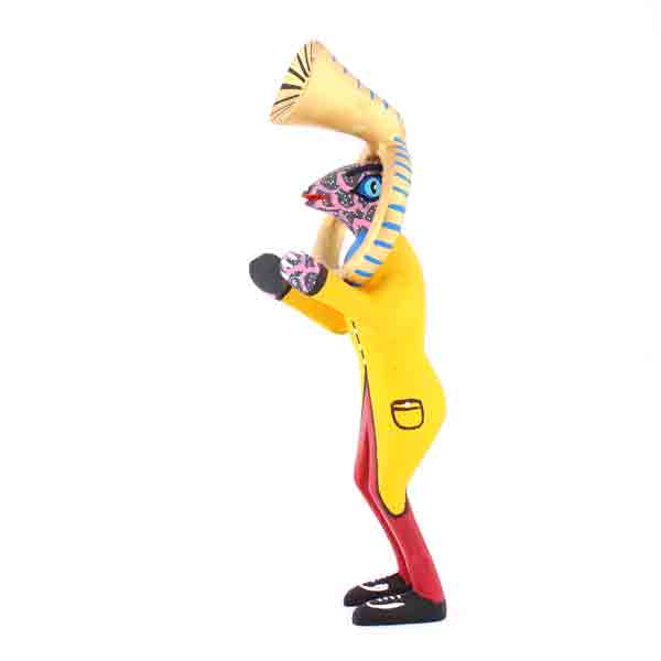 Wooden lizard with french horn by Juventino Melchor